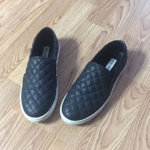 Black Steve Madden slip ons